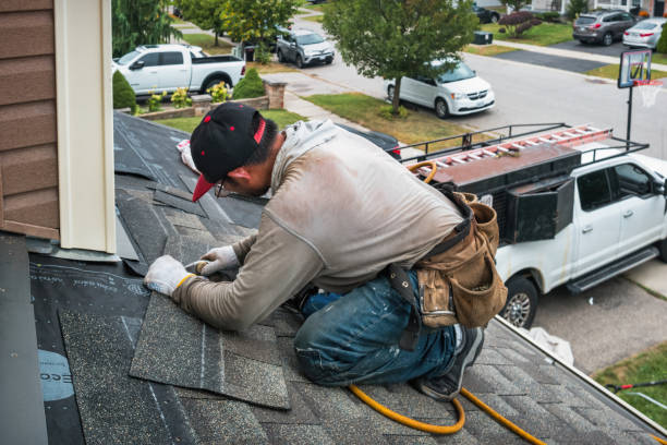 Professional Gutter Installation technician working in Ottsville, PA